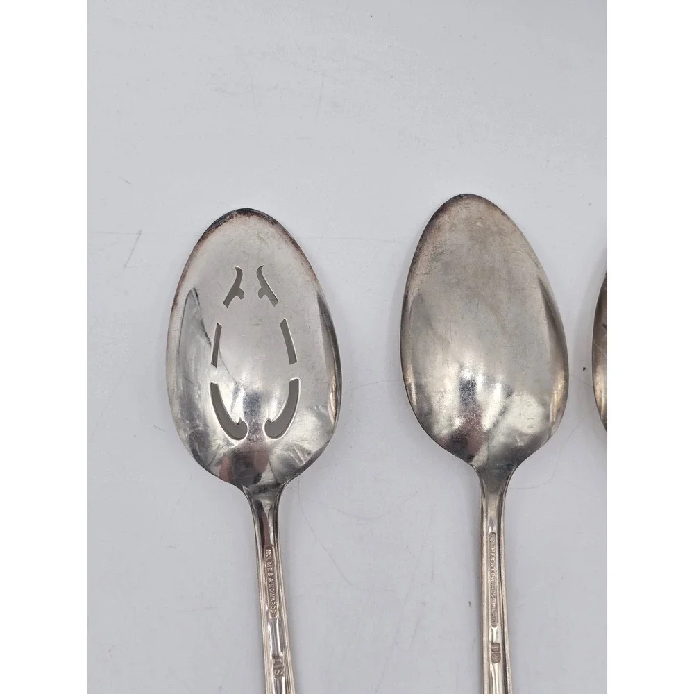 Holmes & Edwards silver one small
